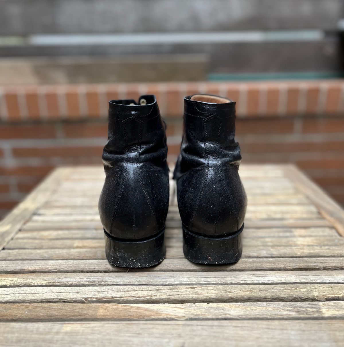 Photo by DesperadoUnderTheEaves on March 5, 2025 of the Black Sign Army Last Mid Cut Dress Boot in Black Kangaroo (Made in Italy).