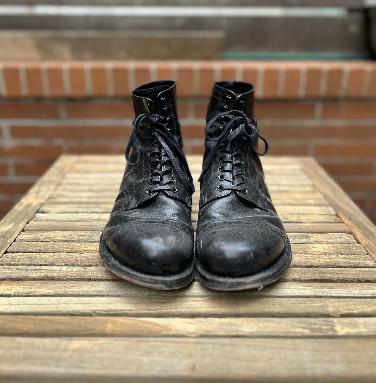 Photo by DesperadoUnderTheEaves on March 5, 2025 of the Black Sign Army Last Mid Cut Dress Boot in Black Kangaroo (Made in Italy).
