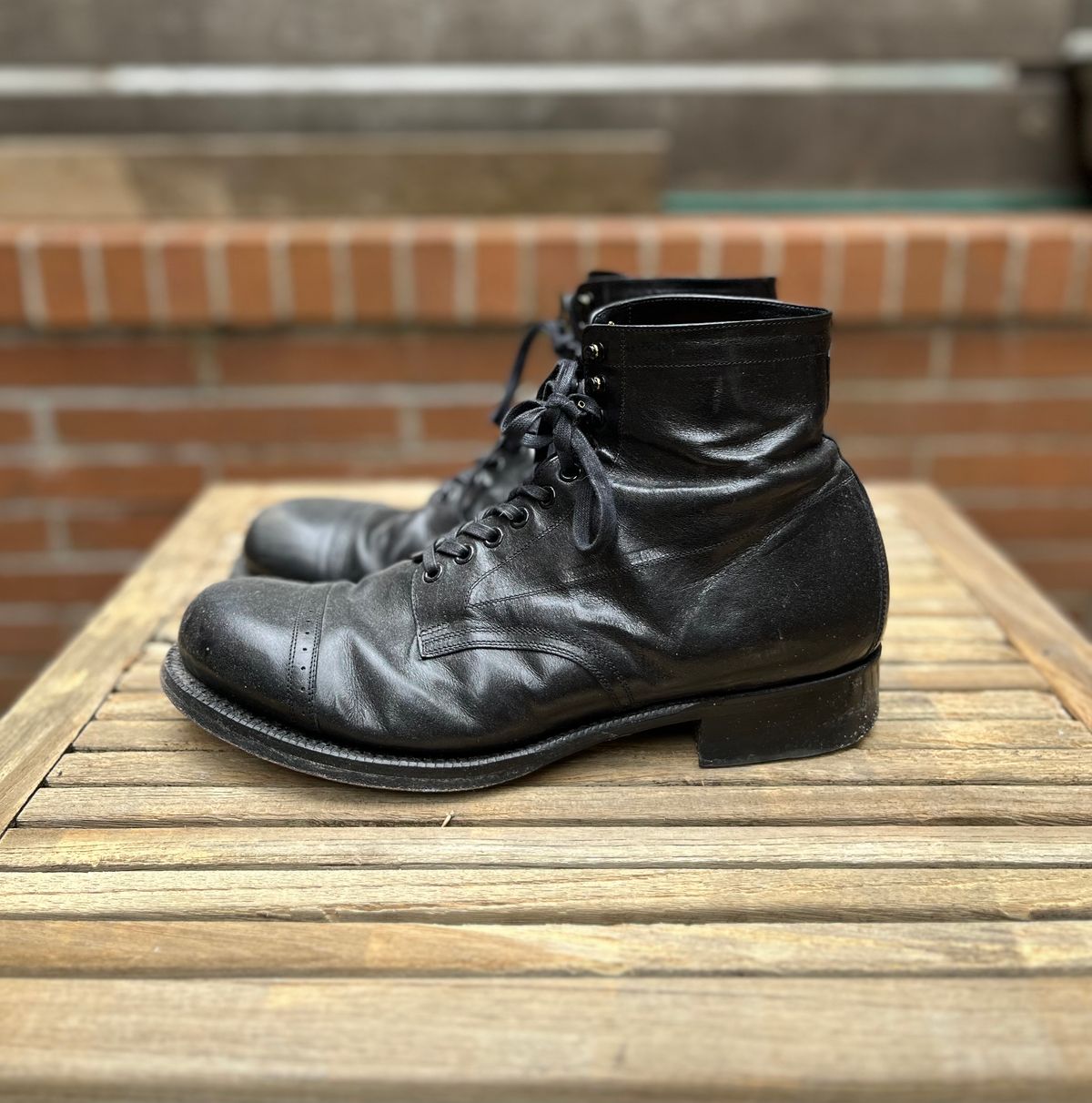 Photo by DesperadoUnderTheEaves on March 5, 2025 of the Black Sign Army Last Mid Cut Dress Boot in Black Kangaroo (Made in Italy).
