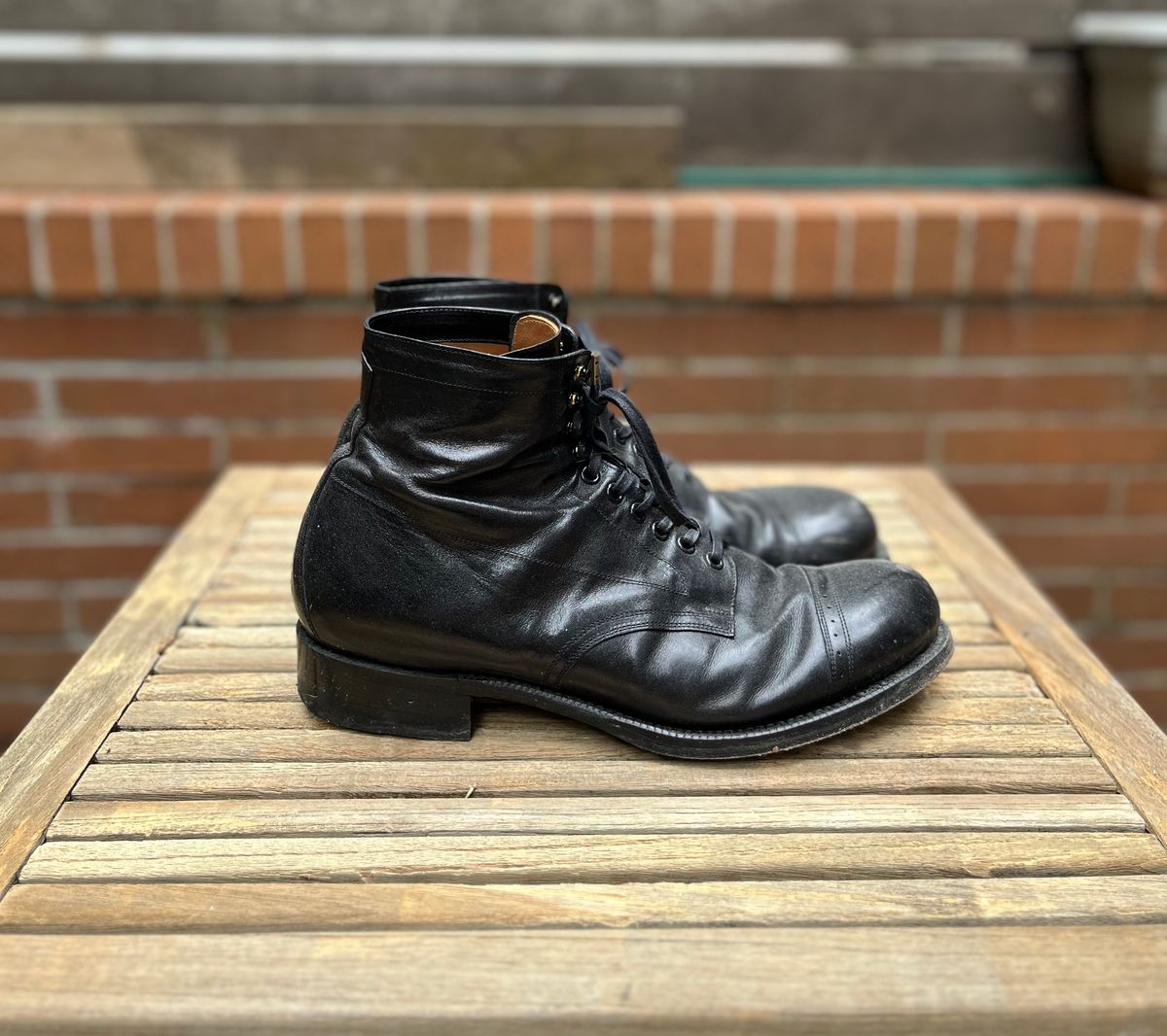 Photo by DesperadoUnderTheEaves on March 5, 2025 of the Black Sign Army Last Mid Cut Dress Boot in Black Kangaroo (Made in Italy).