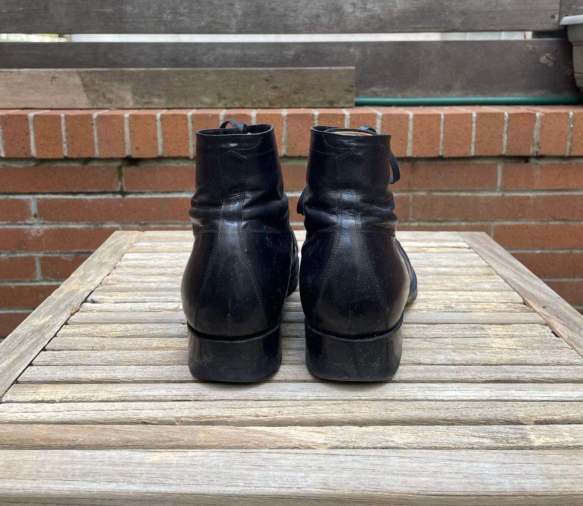 Photo by DesperadoUnderTheEaves on April 5, 2025 of the Black Sign Army Last Mid Cut Dress Boot in Black Kangaroo (Made in Italy).