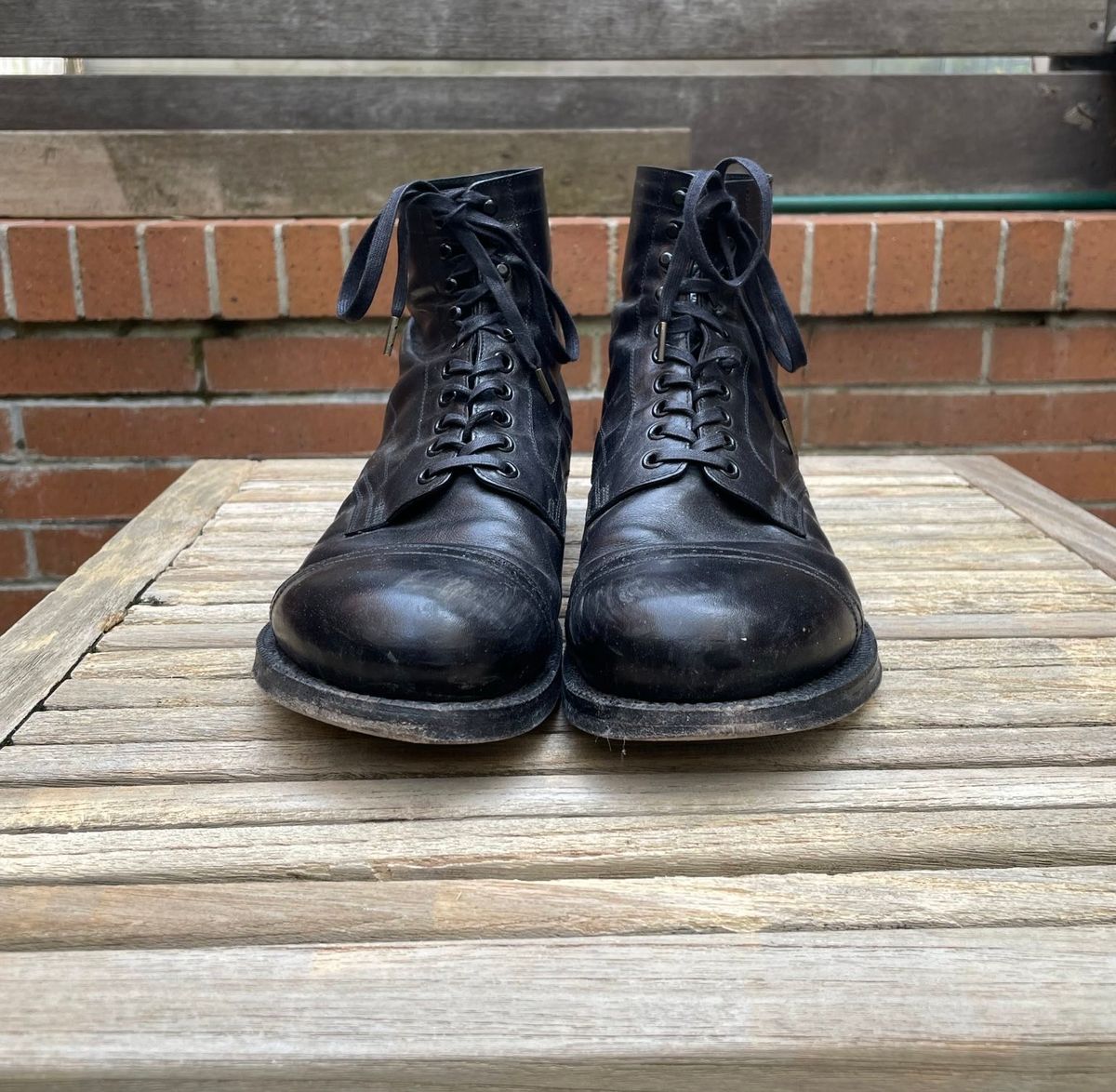 Photo by DesperadoUnderTheEaves on April 5, 2025 of the Black Sign Army Last Mid Cut Dress Boot in Black Kangaroo (Made in Italy).