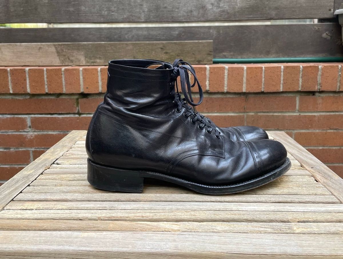 Photo by DesperadoUnderTheEaves on April 5, 2025 of the Black Sign Army Last Mid Cut Dress Boot in Black Kangaroo (Made in Italy).