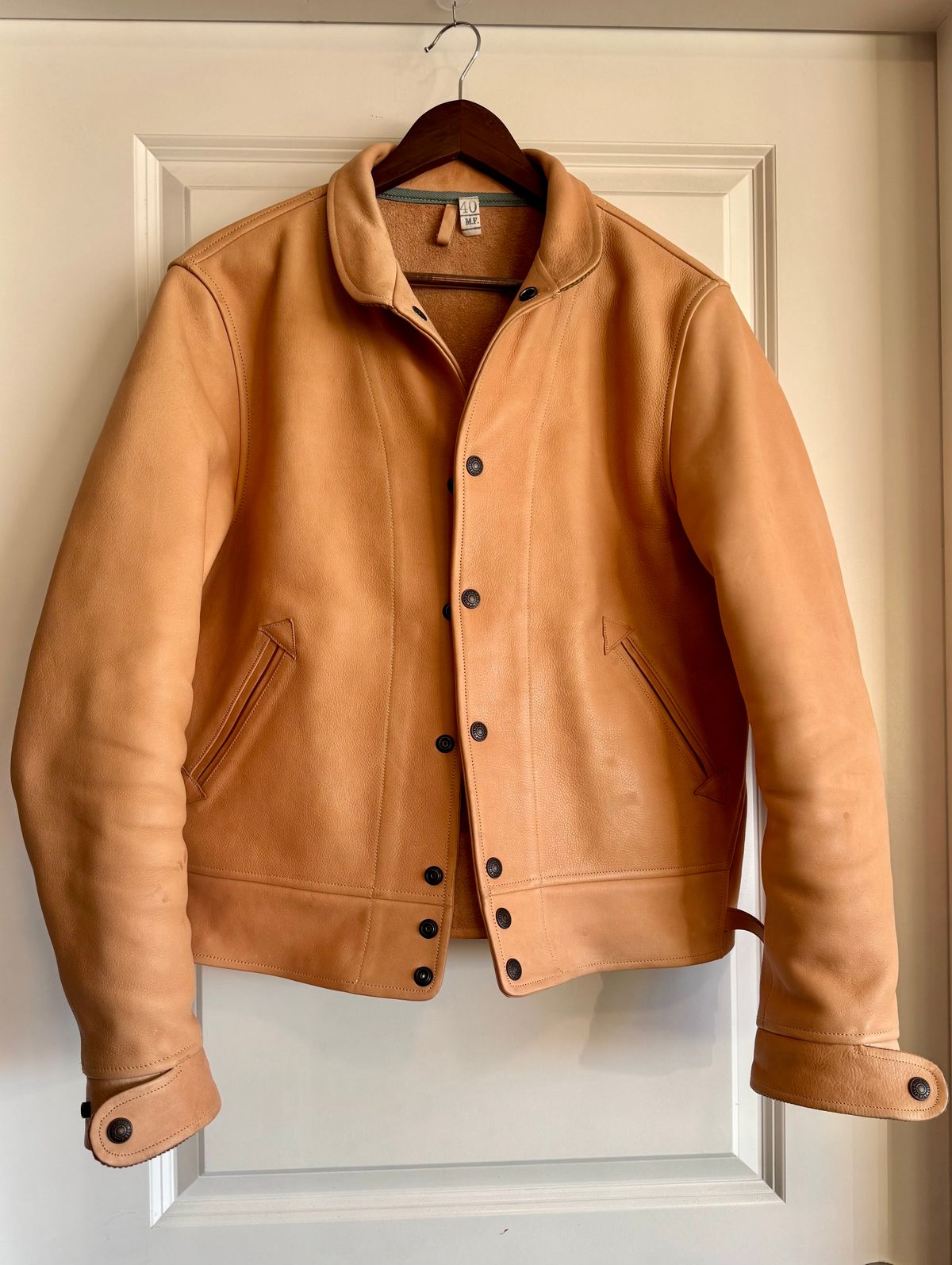 Photo by PatinaTechnodrome on November 20, 2024 of the Mister Freedom Campus Stud Jacket in Natural Veg Tan Cowhide.