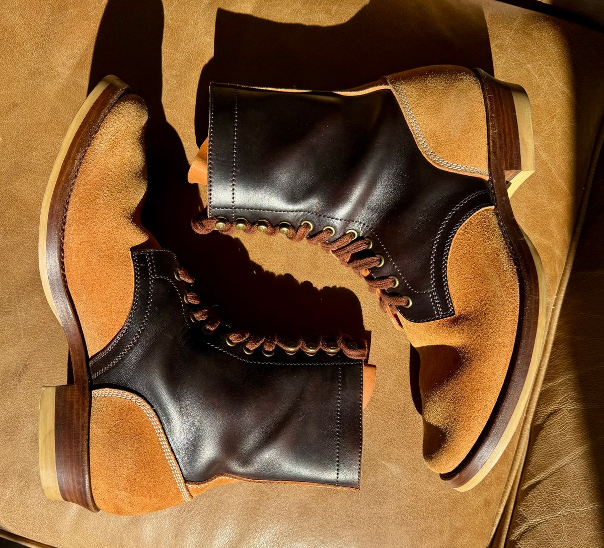 Photo by PatinaTechnodrome on December 5, 2024 of the Flame Panda Service Boot in Maryam Natural Horsebutt Overdyed Brown then Black & Maryam Natural Reverse Horsebutt.