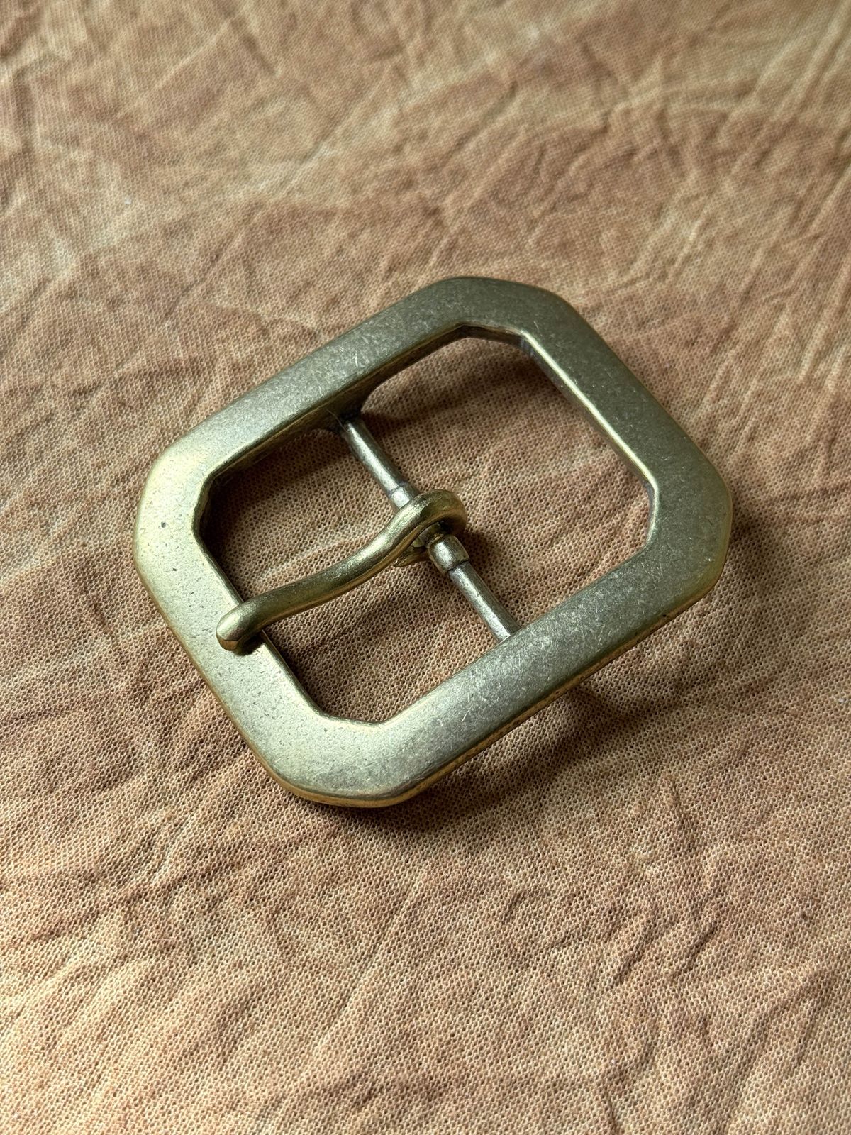 Photo by tlmader on September 4, 2025 of the Titletown Goods Garrison Belt in J&FJ Baker Natural Cross Hatch Bridle.