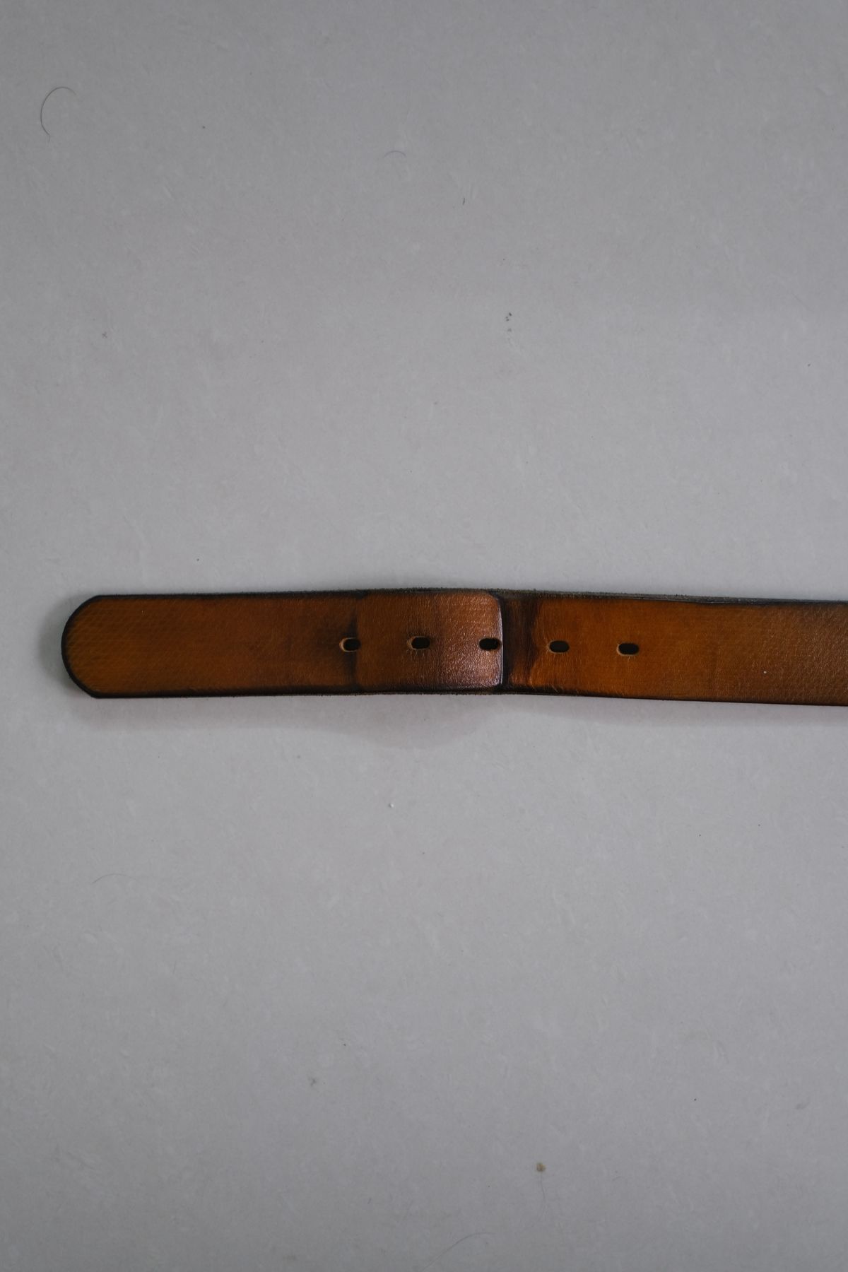 Photo by tlmader on March 6, 2026 of the Titletown Goods Garrison Belt in J&FJ Baker Natural Cross Hatch Bridle.