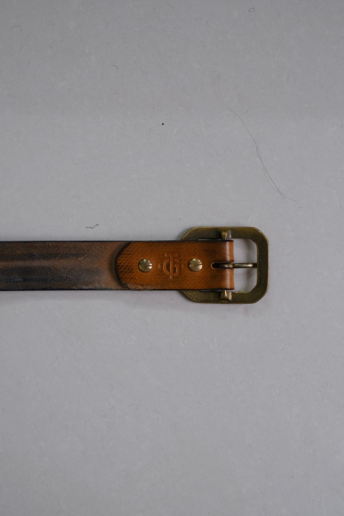 Photo by tlmader on March 6, 2026 of the Titletown Goods Garrison Belt in J&FJ Baker Natural Cross Hatch Bridle.