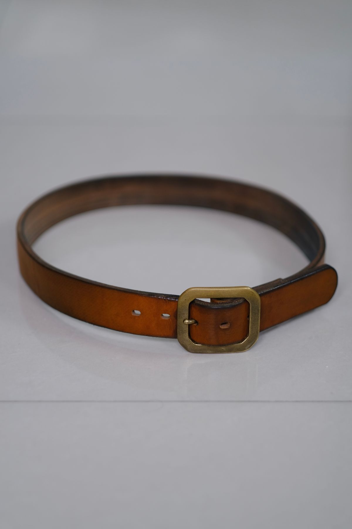 Photo by tlmader on March 6, 2026 of the Titletown Goods Garrison Belt in J&FJ Baker Natural Cross Hatch Bridle.
