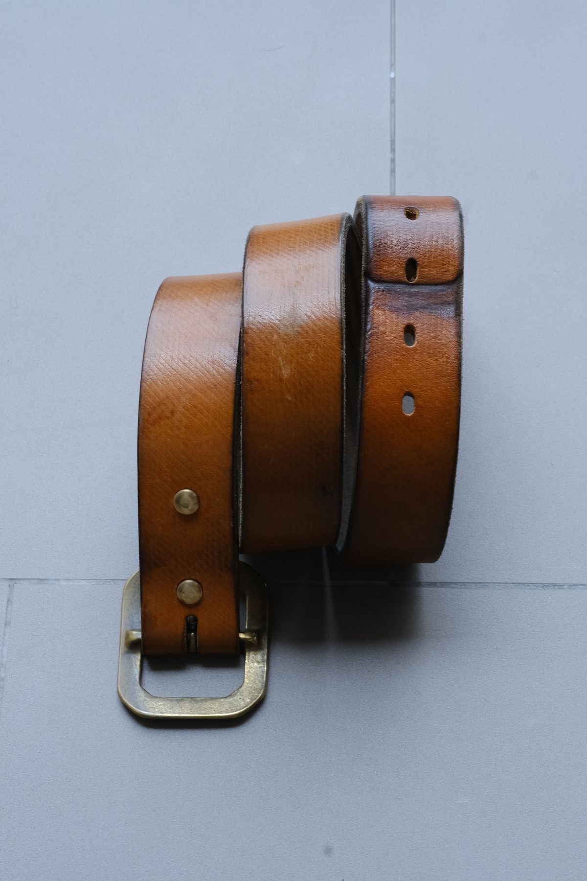 Photo by tlmader on April 6, 2026 of the Titletown Goods Garrison Belt in J&FJ Baker Natural Cross Hatch Bridle.