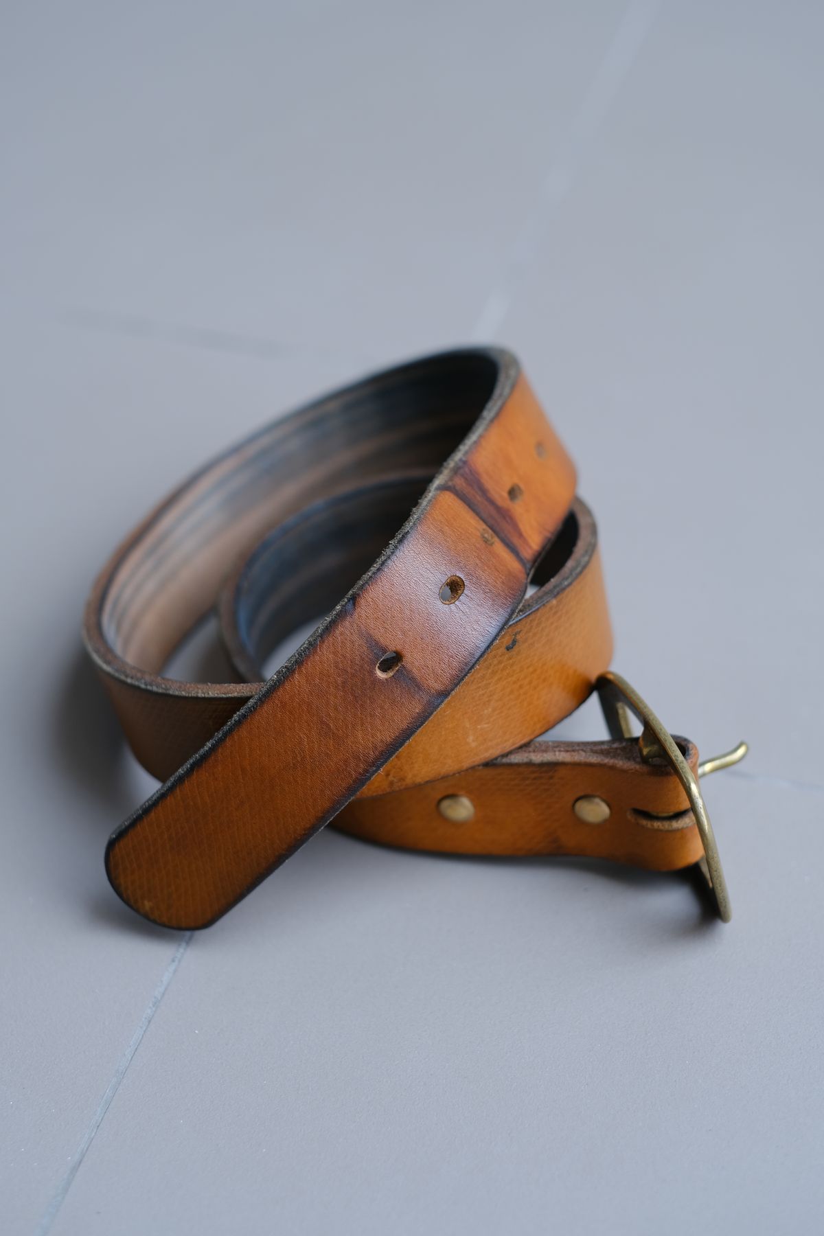 Photo by tlmader on April 6, 2026 of the Titletown Goods Garrison Belt in J&FJ Baker Natural Cross Hatch Bridle.