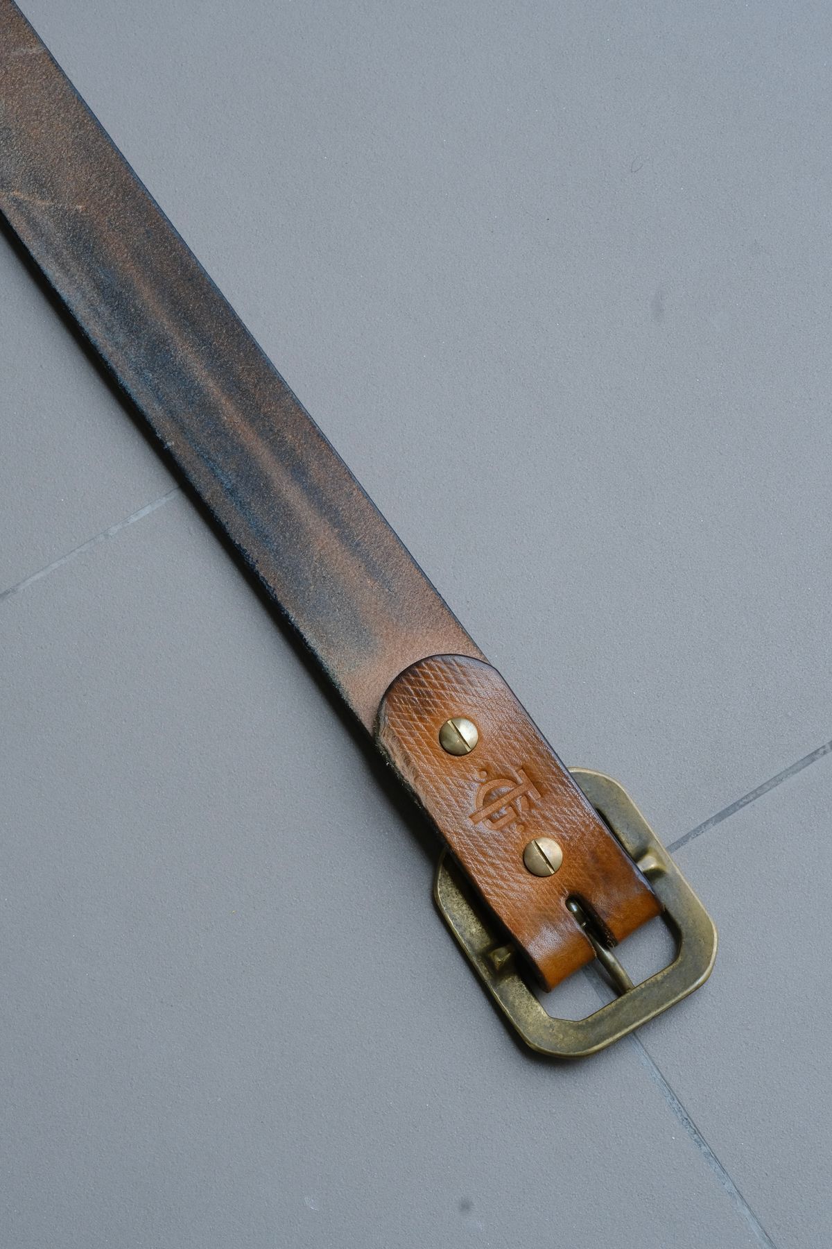Photo by tlmader on April 6, 2026 of the Titletown Goods Garrison Belt in J&FJ Baker Natural Cross Hatch Bridle.