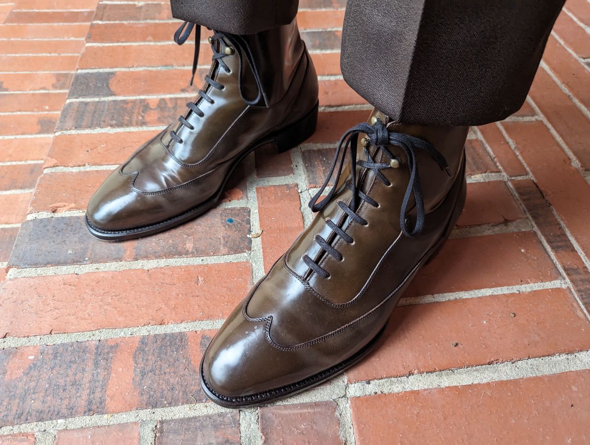 Photo by Ali_LegacyBootworks on October 23, 2023 of the Tread Heavily Shoes Acclamator Austerity Brogue Boot in Horween Dark Cognac Shell Cordovan.