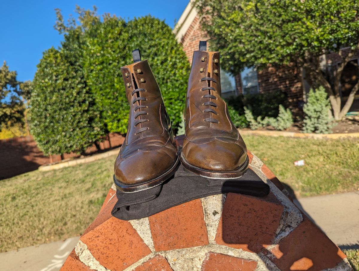 Photo by Ali_LegacyBootworks on November 9, 2023 of the Tread Heavily Shoes Acclamator Austerity Brogue Boot in Horween Dark Cognac Shell Cordovan.