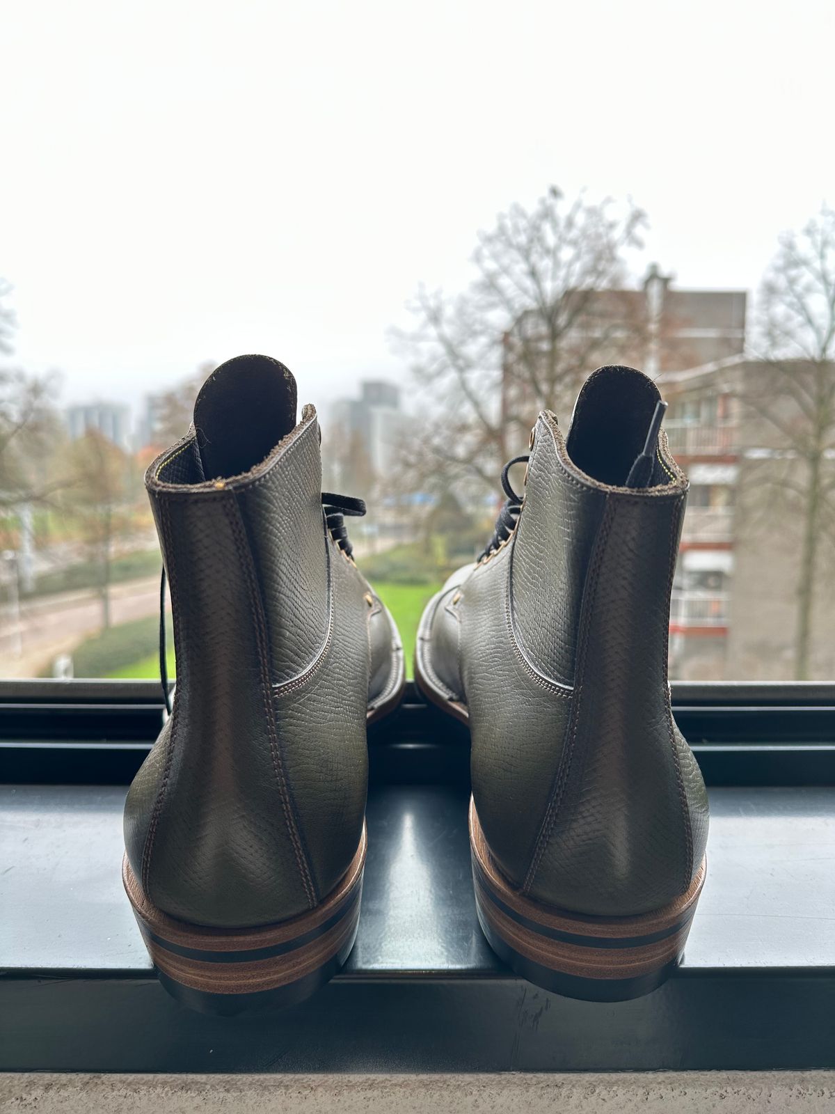 Photo by Darkkp on November 3, 2024 of the Iron Boots x Østmo Type 1 in Horween Green Pioneer Hatchgrain.