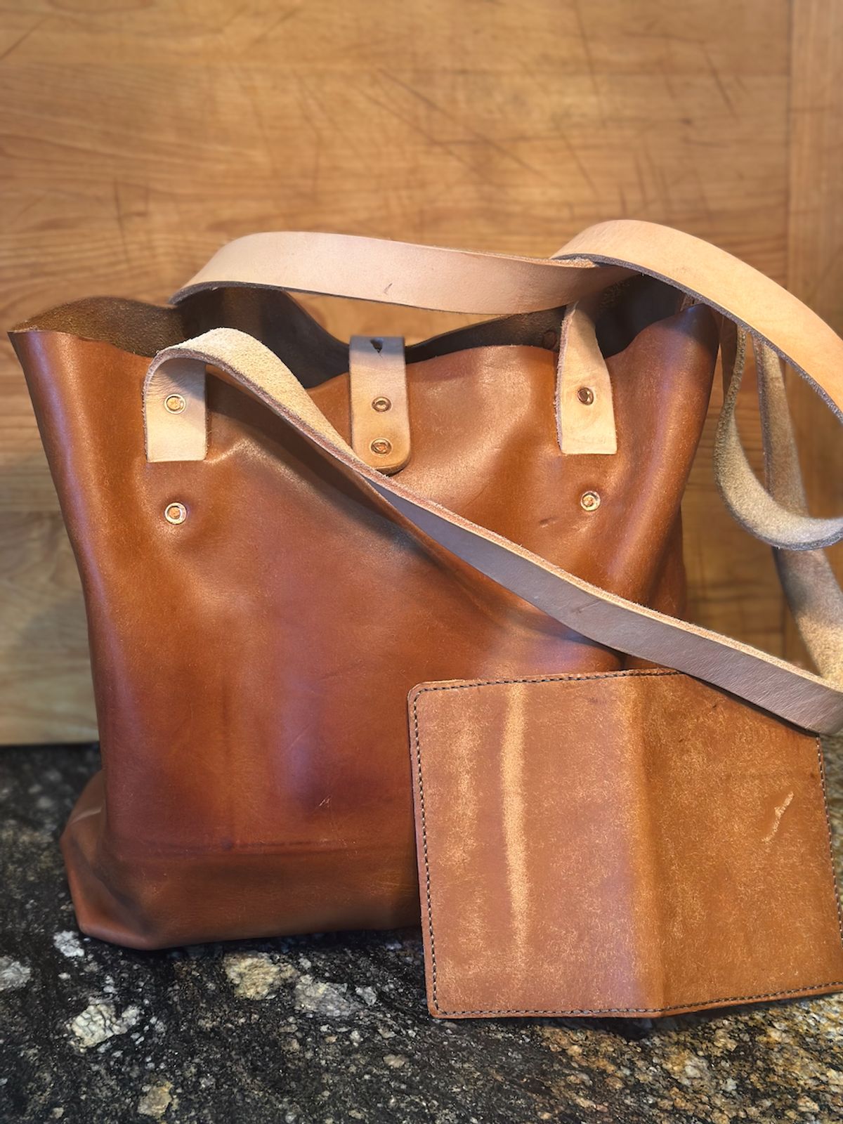 Photo by cows_electronico on November 3, 2025 of the Swampoodle Homemade Goods Tote Bag and Field Notes Cover Combo in Conceria Walpier Natural Mud Rustic Vachetta & Supernatural Natural Veg Tan.
