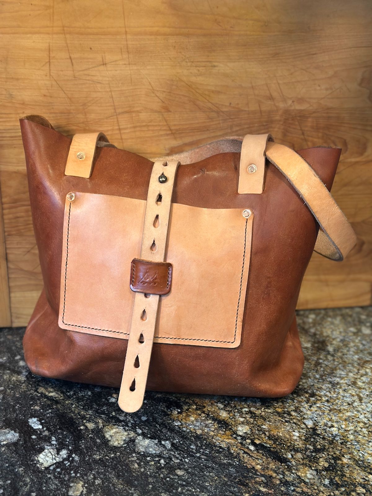 Photo by cows_electronico on December 5, 2025 of the Swampoodle Homemade Goods Tote Bag and Field Notes Cover Combo in Conceria Walpier Natural Mud Rustic Vachetta & Supernatural Natural Veg Tan.