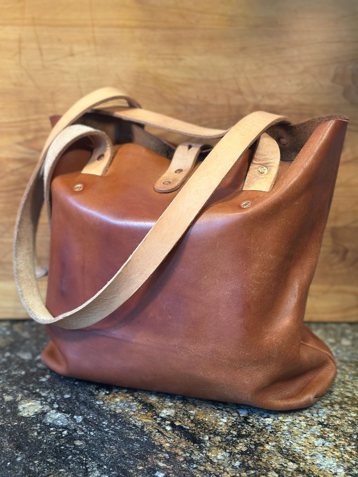 Photo by cows_electronico on December 5, 2025 of the Swampoodle Homemade Goods Tote Bag and Field Notes Cover Combo in Conceria Walpier Natural Mud Rustic Vachetta & Supernatural Natural Veg Tan.