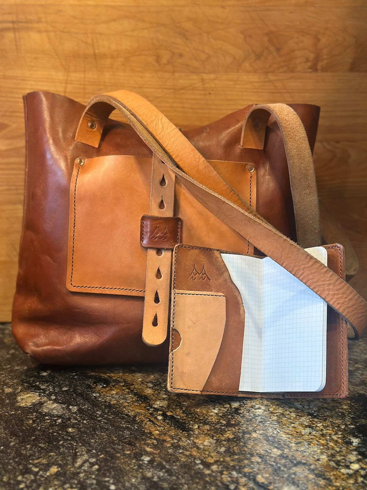 Photo by cows_electronico on March 4, 2026 of the Swampoodle Homemade Goods Tote Bag and Field Notes Cover Combo in Conceria Walpier Natural Mud Rustic Vachetta & Supernatural Natural Veg Tan.