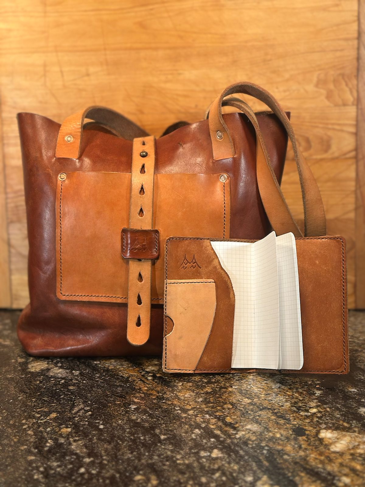 Photo by cows_electronico on April 3, 2026 of the Swampoodle Homemade Goods Tote Bag and Field Notes Cover Combo in Supernatural Natural Veg Tan & Badalassi Carlo Cognac Pueblo.