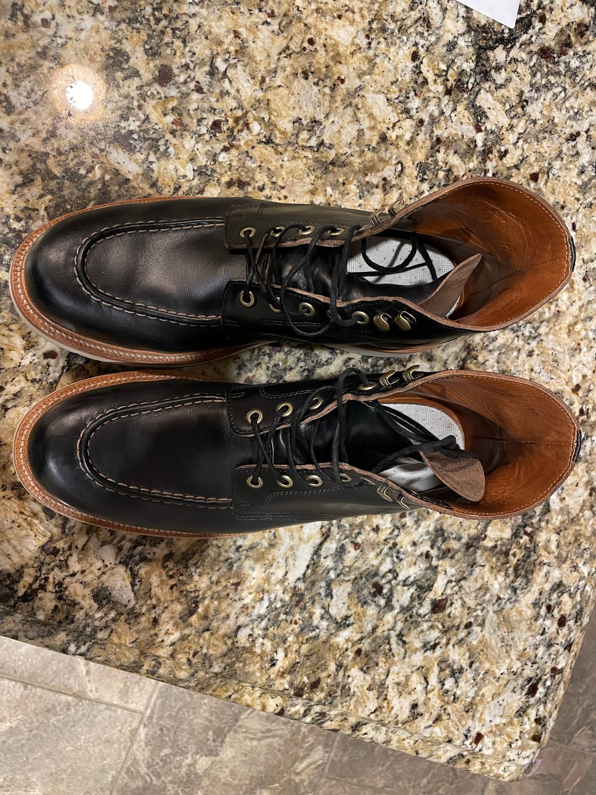 Photo by stheisen on November 3, 2022 of the Grant Stone Brass Boot in Horween Black Chromexcel.