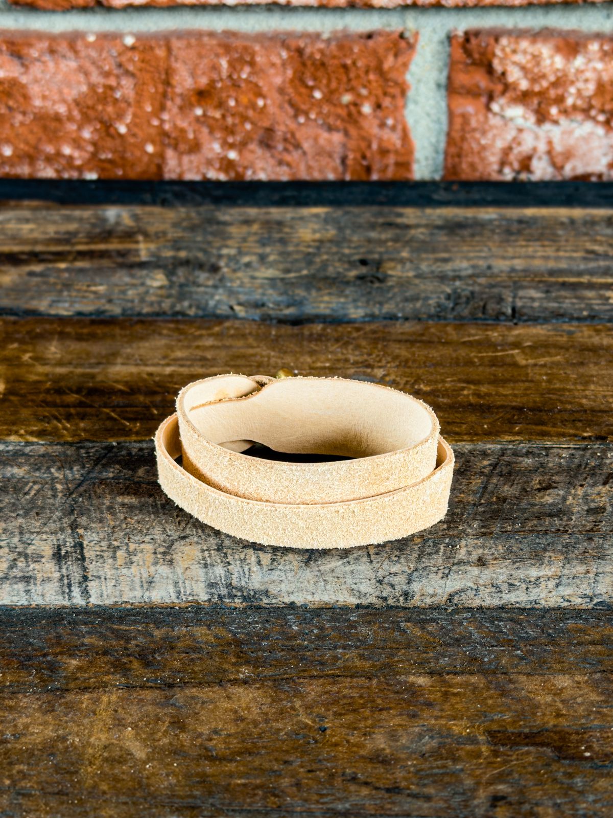 Photo by KVanDev on October 4, 2025 of the Harker Leatherworks Leather cuff in Unknown Natural Veg Tan Roughout.