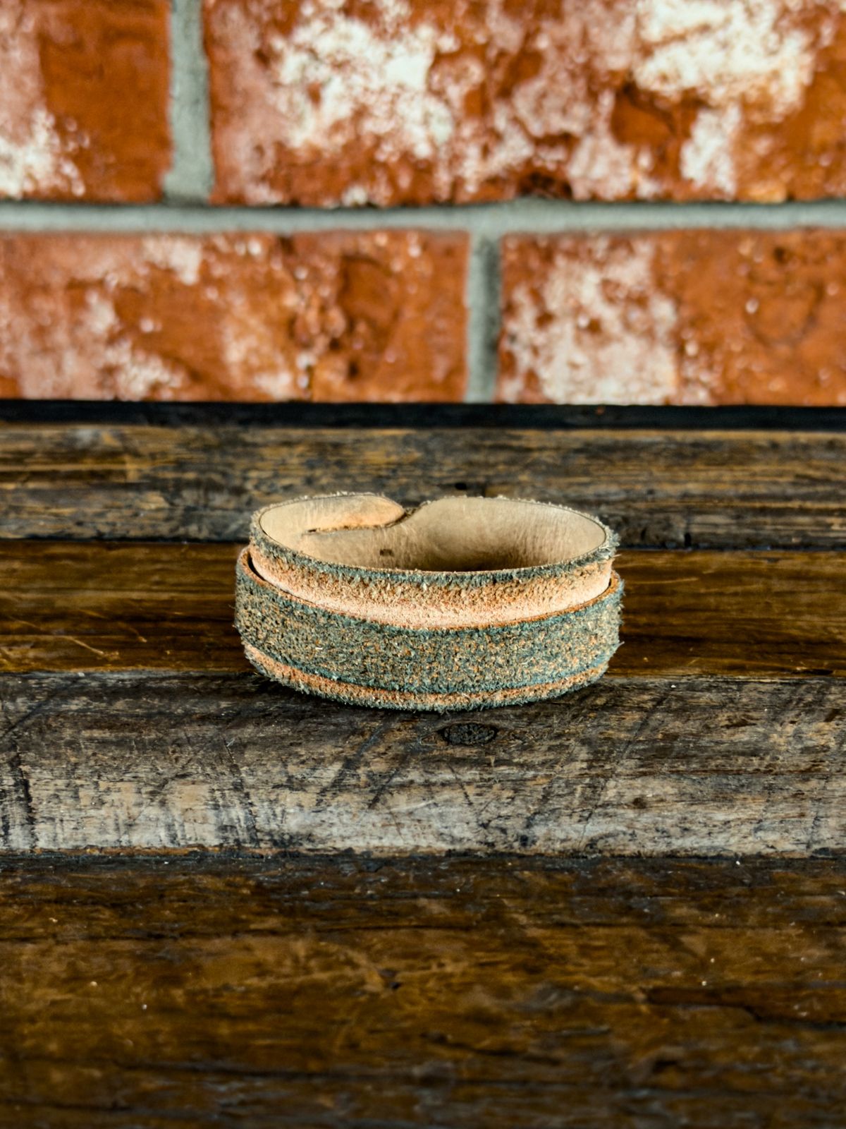 Photo by KVanDev on December 1, 2025 of the Harker Leatherworks Leather cuff in Unknown Natural Veg Tan Roughout.