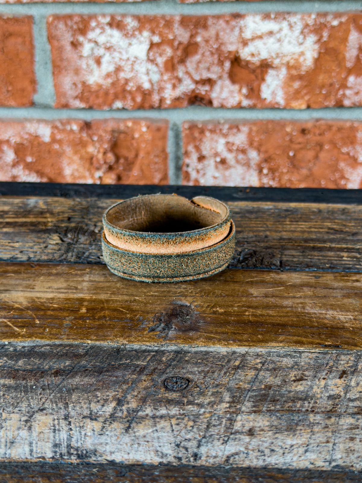 Photo by KVanDev on April 5, 2026 of the Harker Leatherworks Leather cuff in Unknown Natural Veg Tan Roughout.