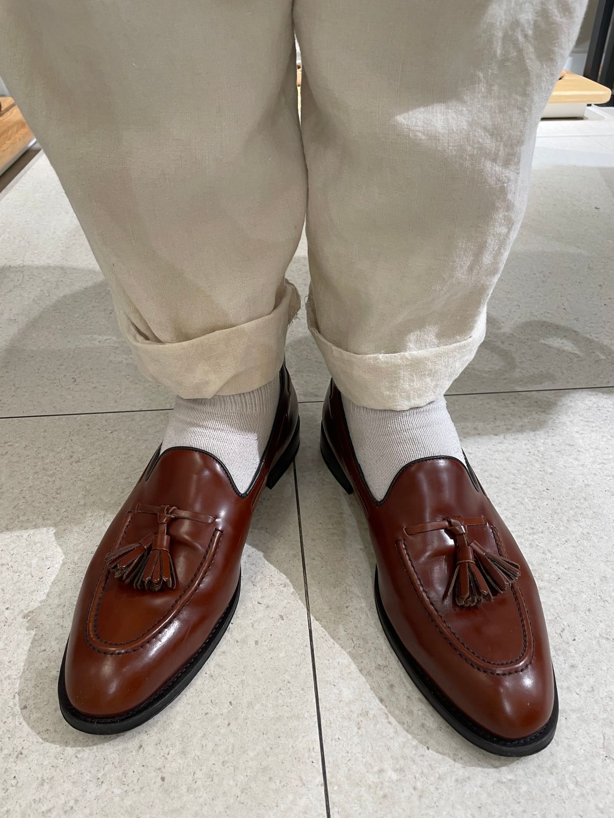 Photo by solidsalami117 on October 11, 2025 of the Hawes & Curtis Tassel Loafers in Tan Polido Calf.