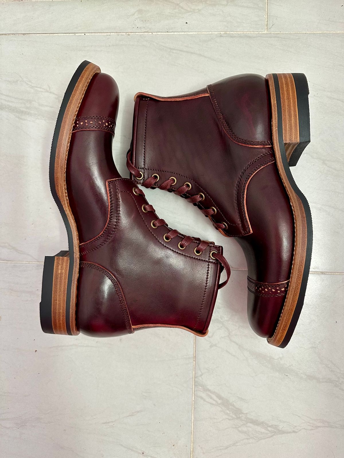 Photo by 3135movt on January 6, 2024 of the Flame Panda Brogue Cap Toe Service Boot in Maryam Burgundy-Overdyed Horsebutt.