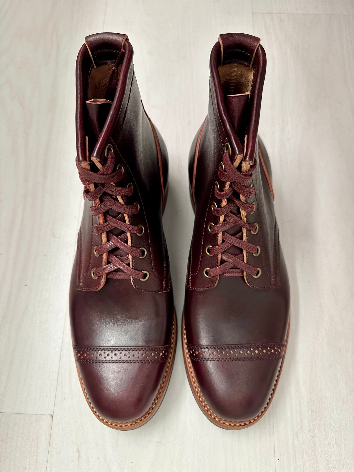 Photo by 3135movt on January 6, 2024 of the Flame Panda Brogue Cap Toe Service Boot in Maryam Burgundy-Overdyed Horsebutt.