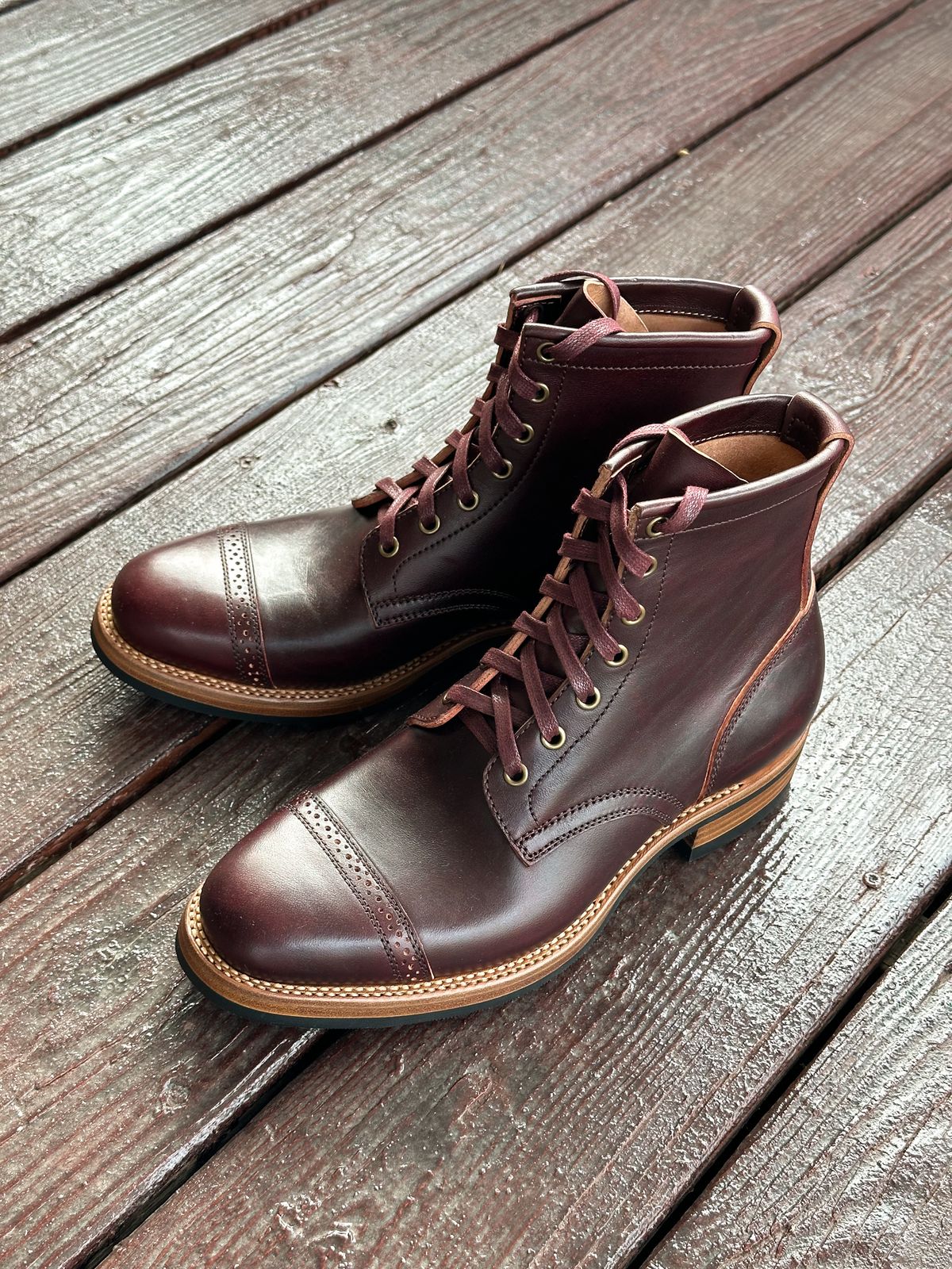 Photo by 3135movt on December 6, 2023 of the Flame Panda Brogue Cap Toe Service Boot in Maryam Burgundy-Overdyed Horsebutt.