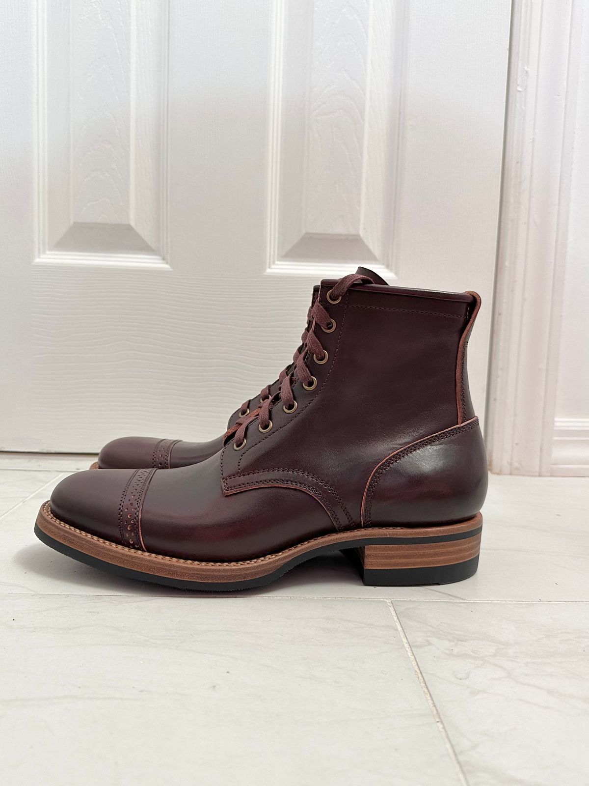 Photo by 3135movt on December 6, 2023 of the Flame Panda Brogue Cap Toe Service Boot in Maryam Burgundy-Overdyed Horsebutt.