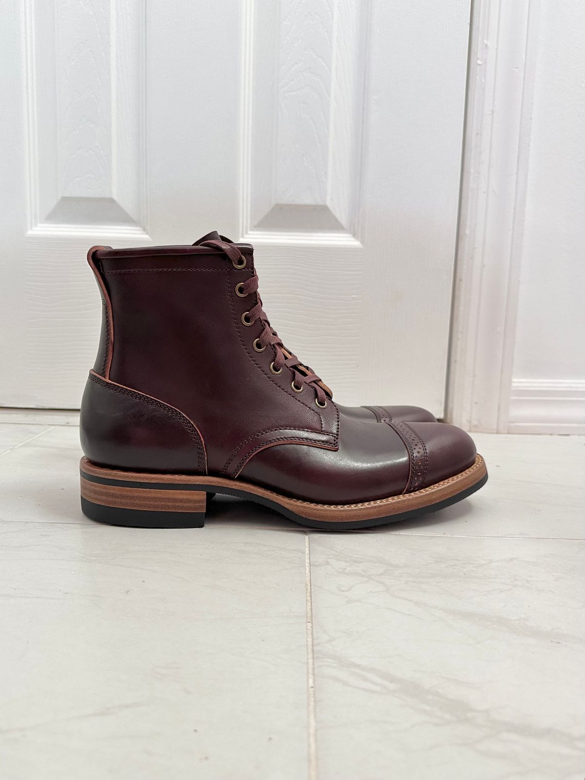 Photo by 3135movt on December 6, 2023 of the Flame Panda Brogue Cap Toe Service Boot in Maryam Burgundy-Overdyed Horsebutt.