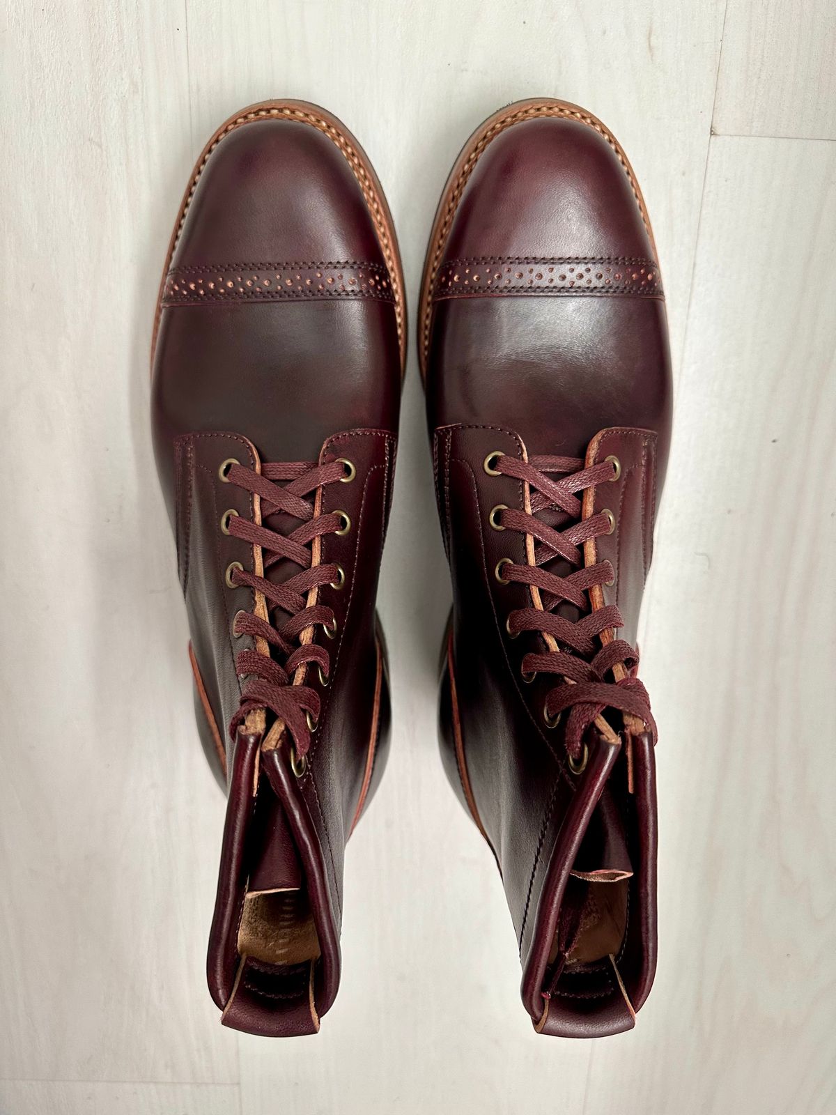 Photo by 3135movt on November 2, 2023 of the Flame Panda Brogue Cap Toe Service Boot in Maryam Burgundy-Overdyed Horsebutt.