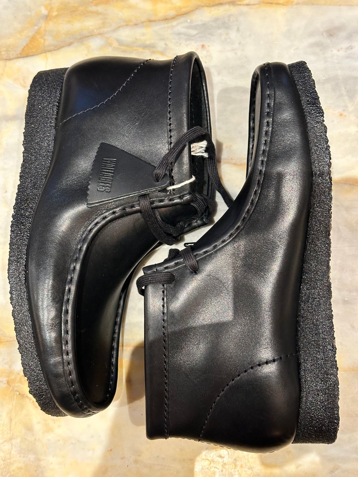 Photo by realtreeroman on November 5, 2023 of the Clarks Wallabee Boot in Unknown Leather.
