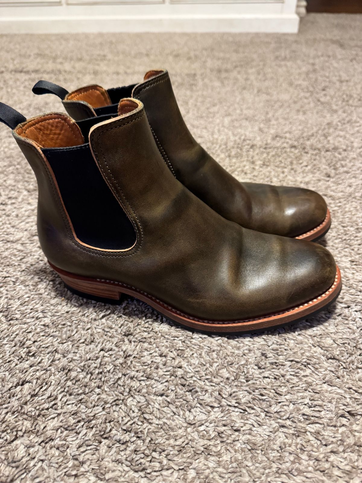 Photo by johnkrauser on October 1, 2025 of the Flame Panda Wholecut Chelsea in Natural Horsebutt Overdyed Olive.