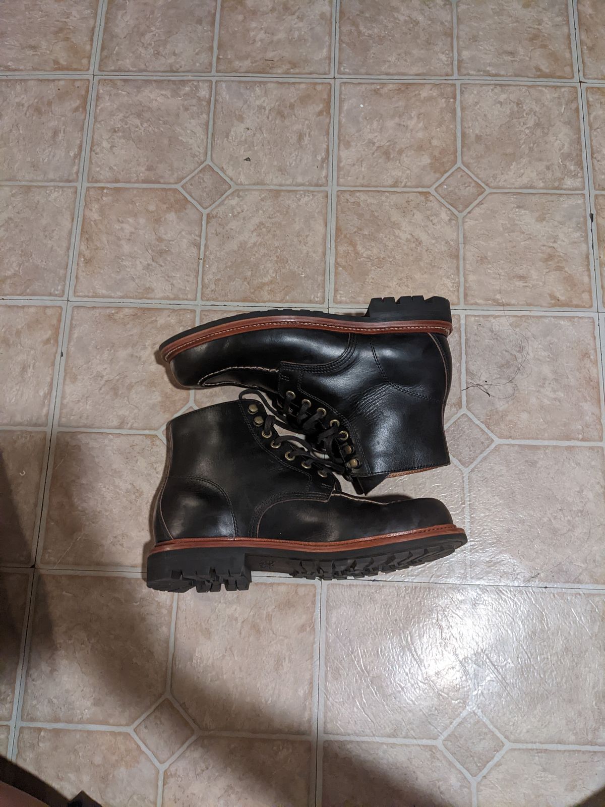 Photo by withinthenebula on October 6, 2022 of the Grant Stone Brass Boot in Horween Black Chromexcel.