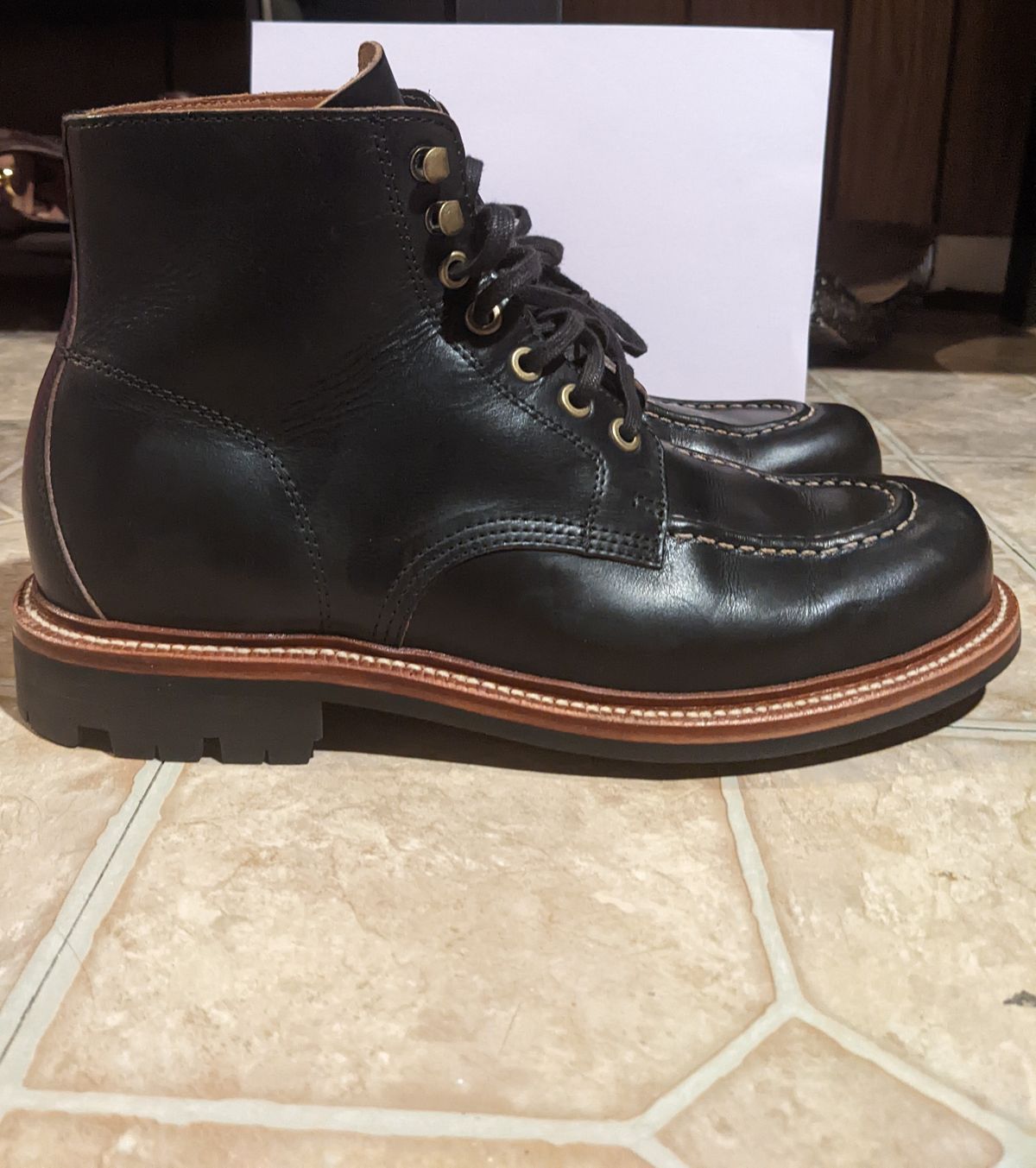 Photo by withinthenebula on October 6, 2022 of the Grant Stone Brass Boot in Horween Black Chromexcel.