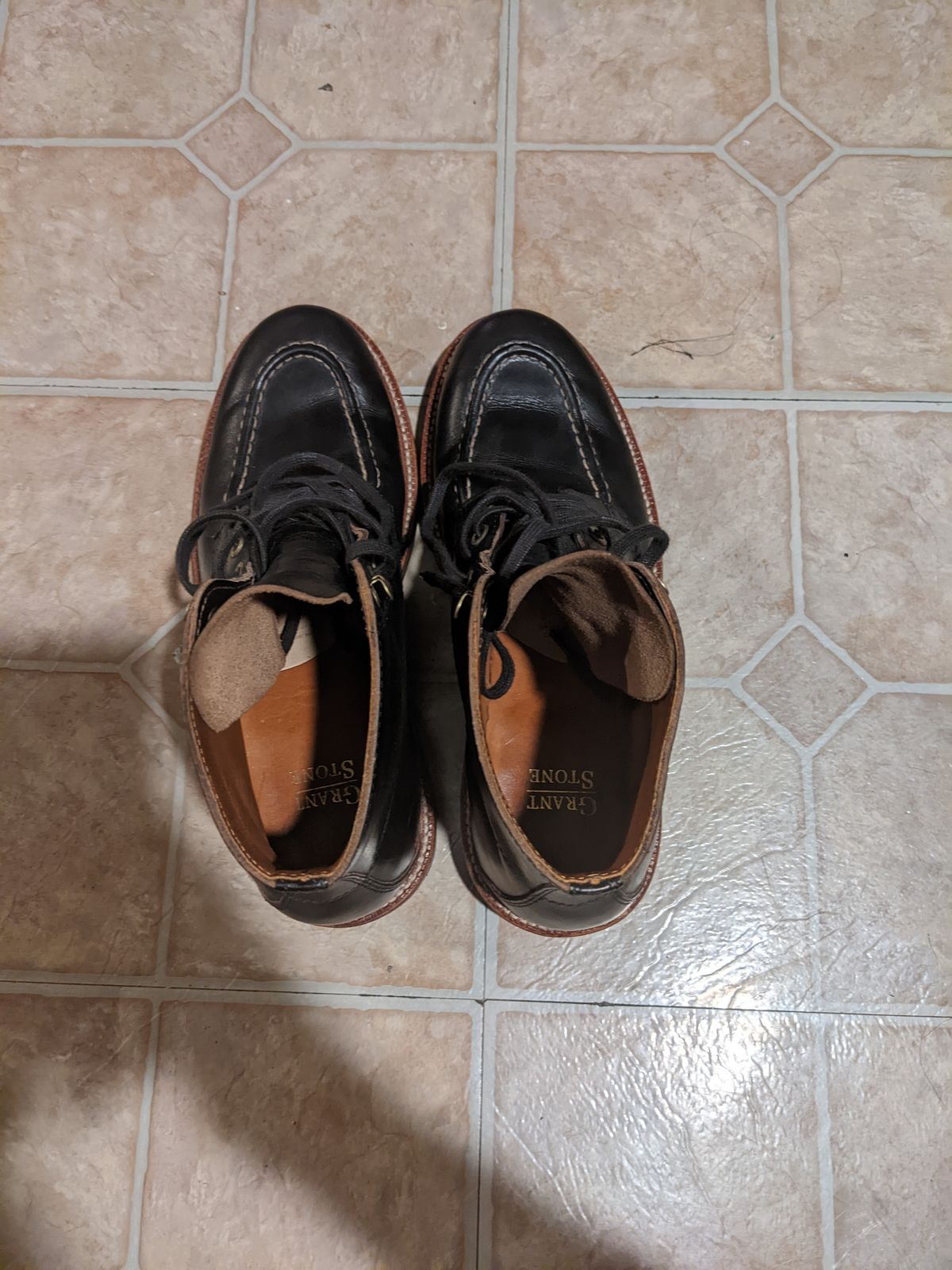 Photo by withinthenebula on October 6, 2022 of the Grant Stone Brass Boot in Horween Black Chromexcel.