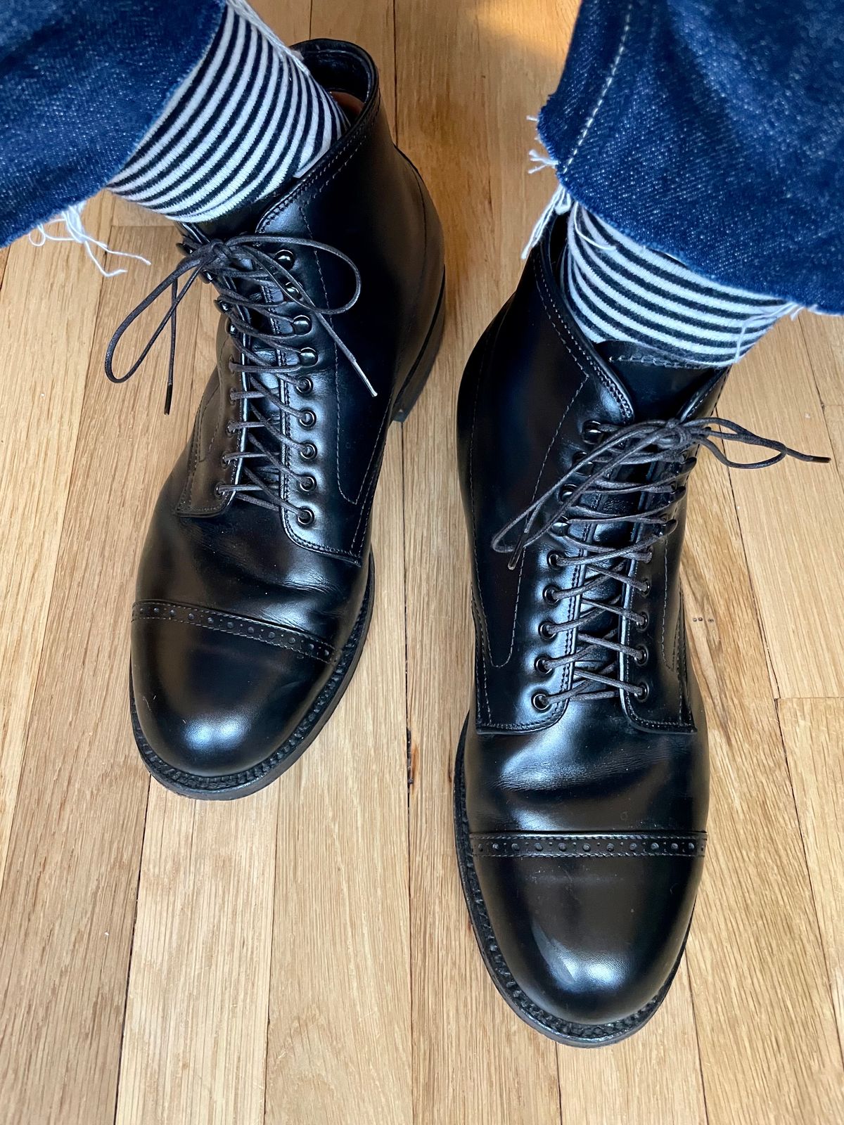 Photo by goodboots_badfeet on June 20, 2023 of the Alden Perforated Cap Toe Boot in D'Annonay Black Calf.