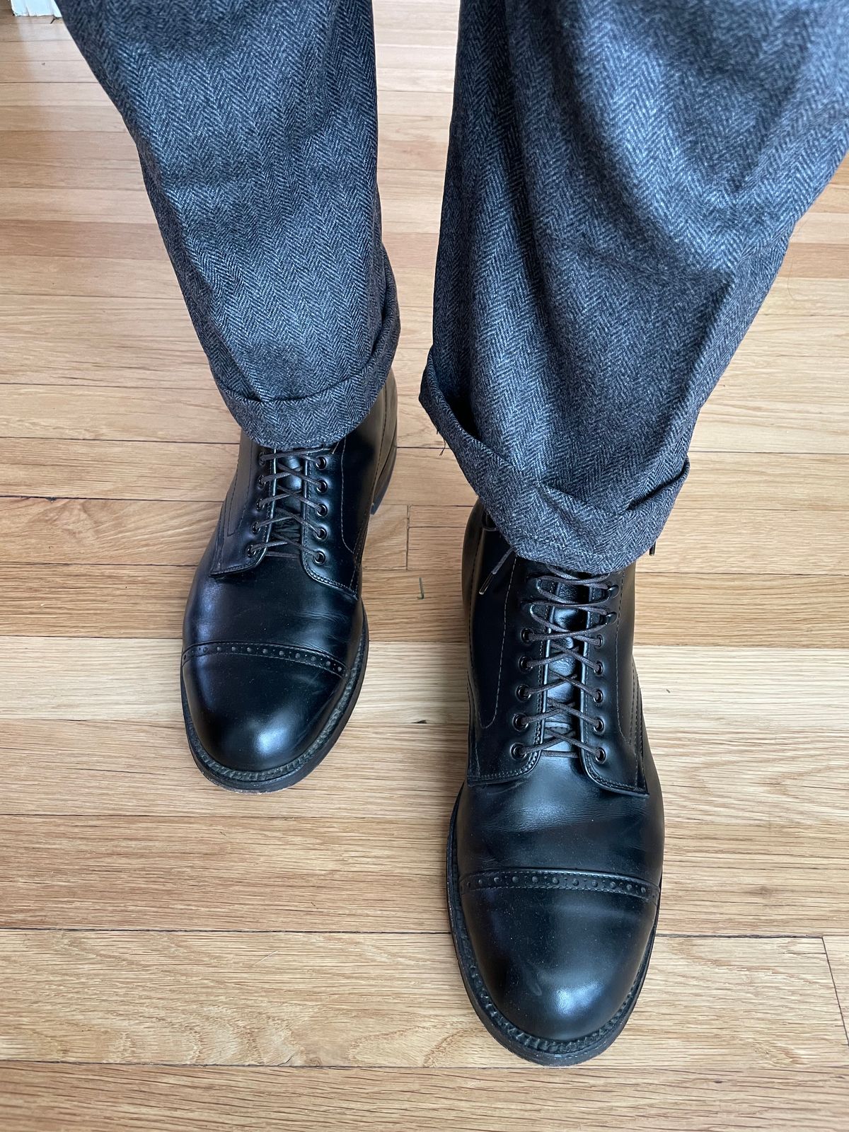 Photo by goodboots_badfeet on December 5, 2023 of the Alden Perforated Cap Toe Boot in D'Annonay Black Calf.