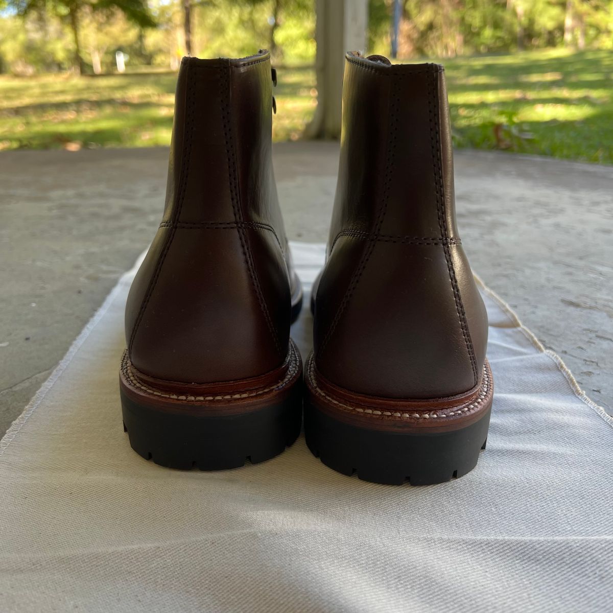 Photo by RetiredFounderofSDPBirkGang on October 1, 2022 of the Grant Stone Brass Boot in Horween Crimson Chromexcel.