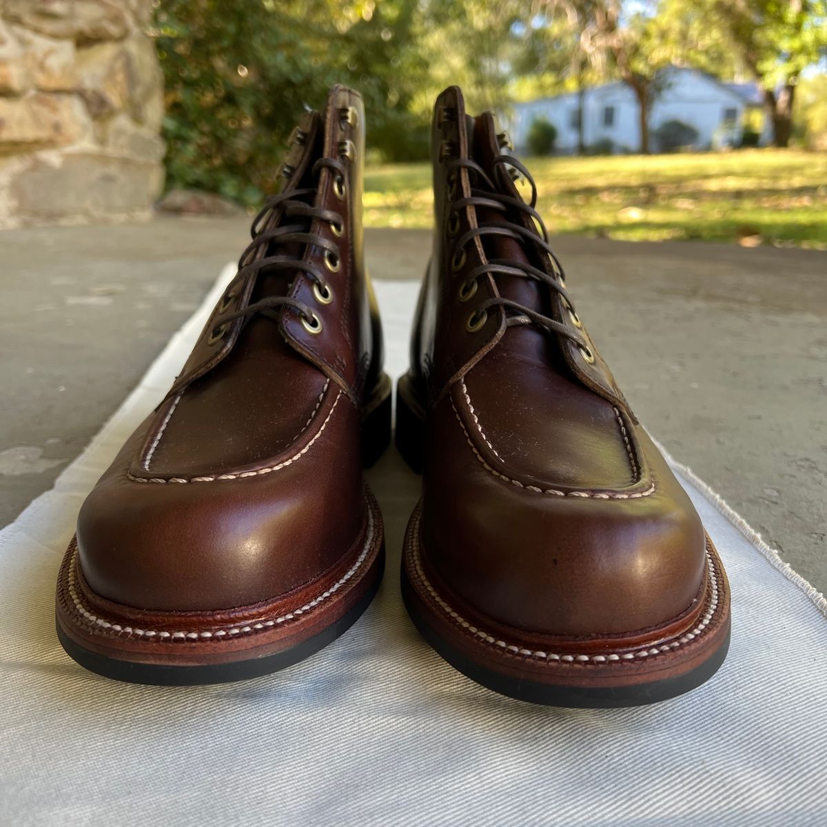 Photo by RetiredFounderofSDPBirkGang on October 1, 2022 of the Grant Stone Brass Boot in Horween Crimson Chromexcel.