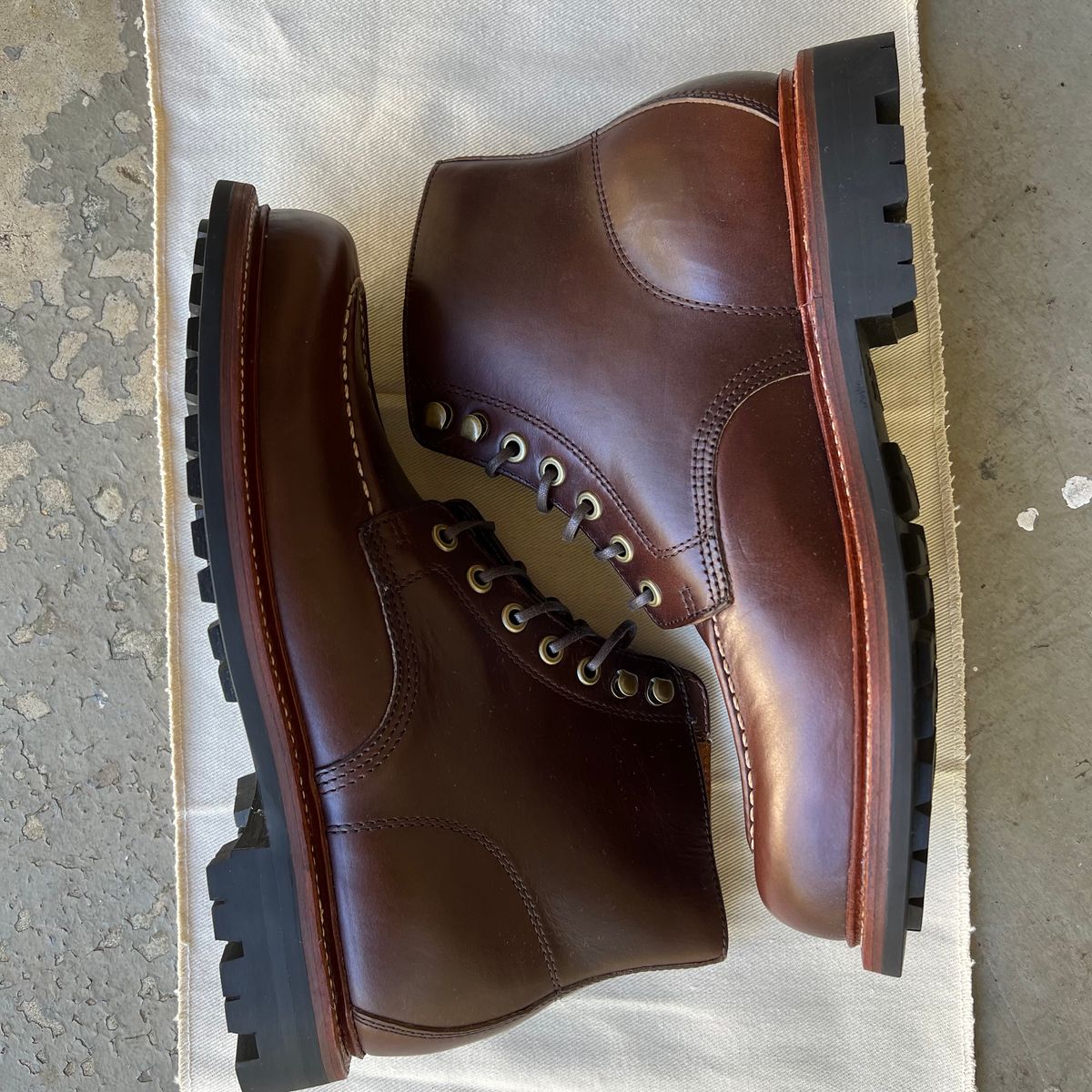 Photo by RetiredFounderofSDPBirkGang on October 1, 2022 of the Grant Stone Brass Boot in Horween Crimson Chromexcel.