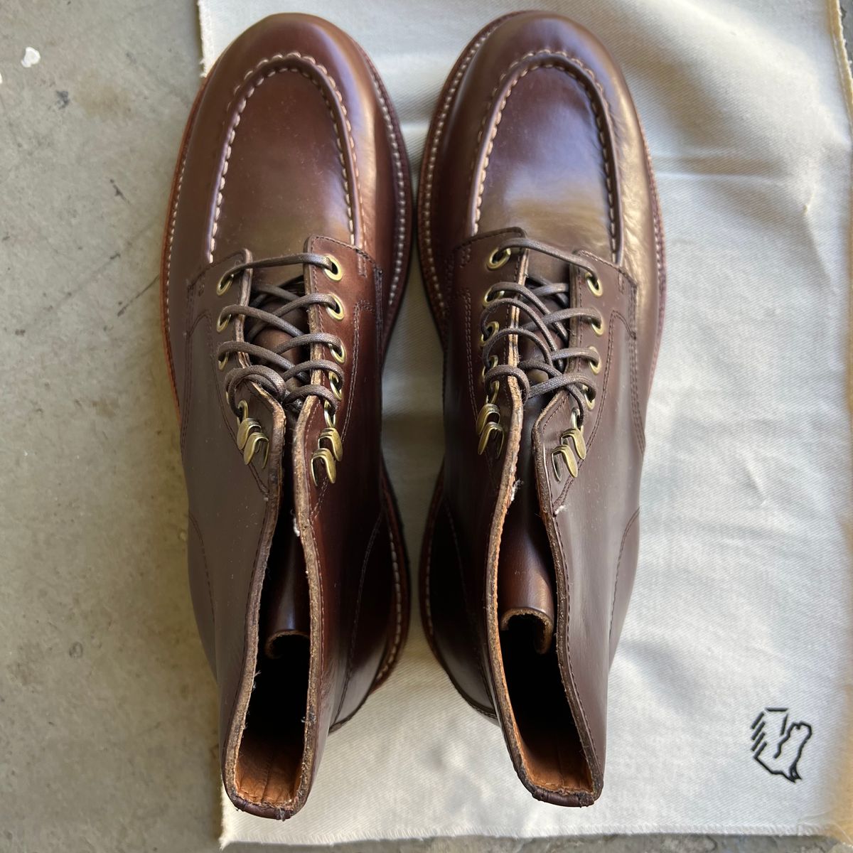 Photo by RetiredFounderofSDPBirkGang on October 1, 2022 of the Grant Stone Brass Boot in Horween Crimson Chromexcel.