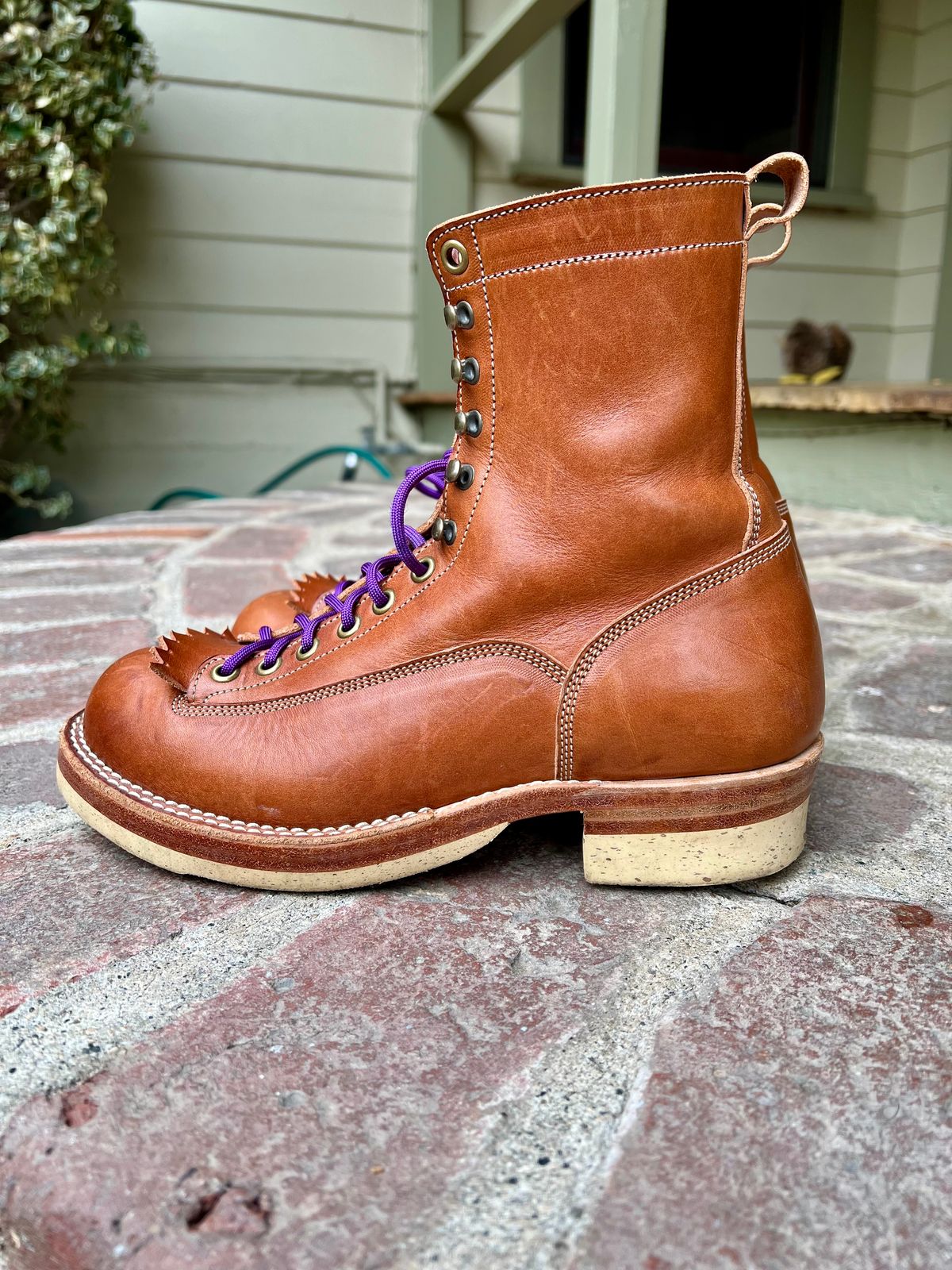 Photo by robyn on April 16, 2023 of the Onderhoud LCV01 Lineman Boot in Wickett & Craig Buck Brown Traditional Harness.