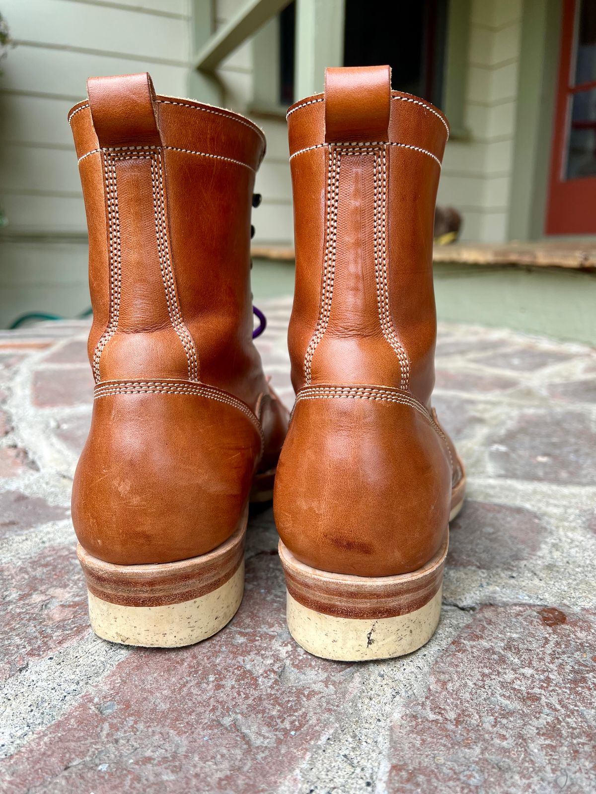 Photo by robyn on April 16, 2023 of the Onderhoud LCV01 Lineman Boot in Wickett & Craig Buck Brown Traditional Harness.