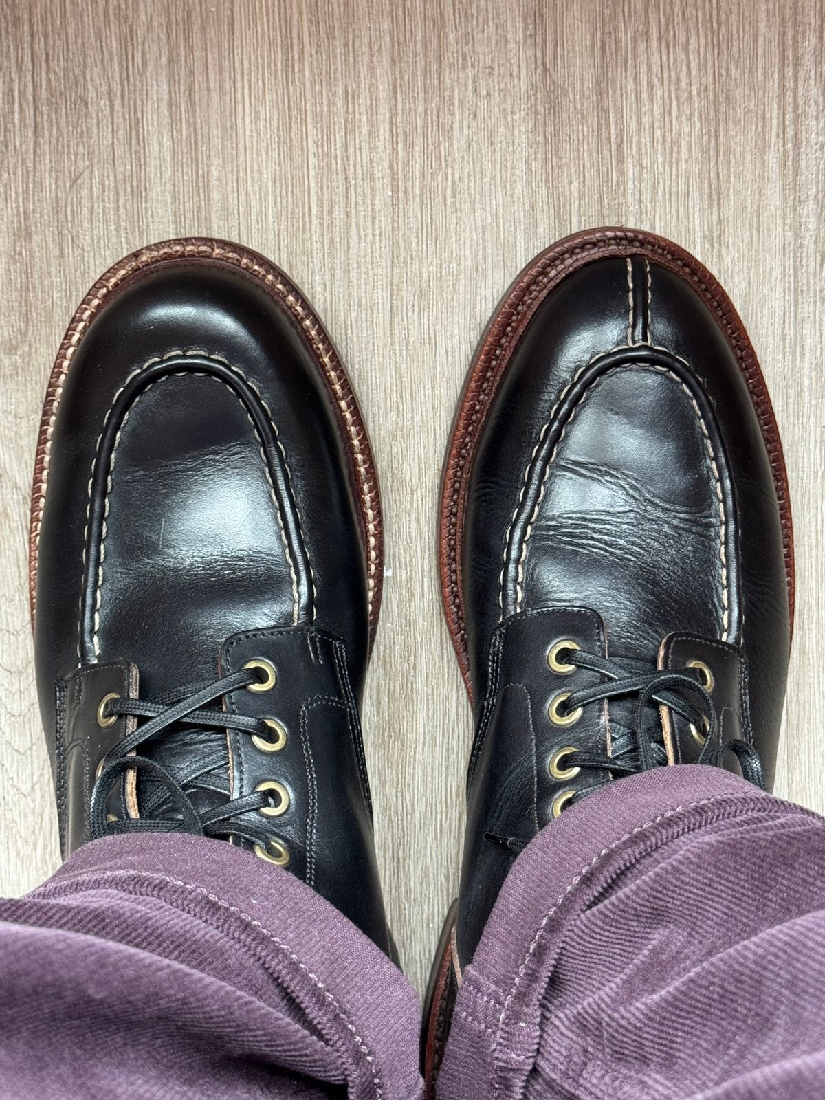 Photo by Bota71 on December 25, 2025 of the Grant Stone Brass Boot in Horween Black Chromexcel.