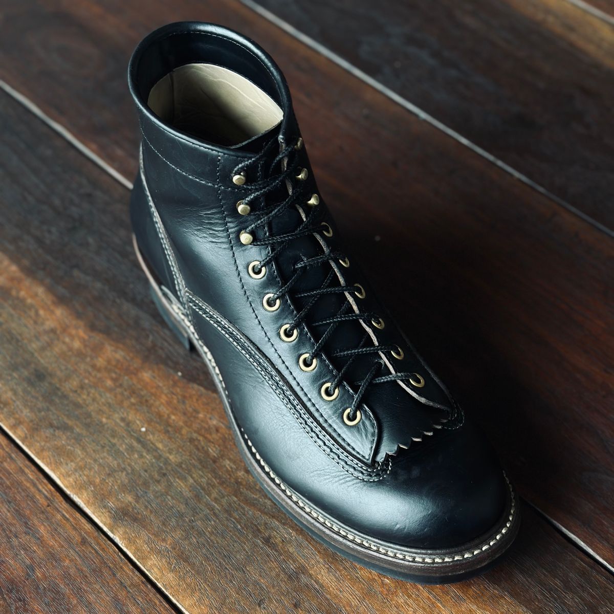 Photo by selvedge.and.boots on January 6, 2024 of the John Lofgren Donkey Puncher Boots in Horween Black Chromexcel.